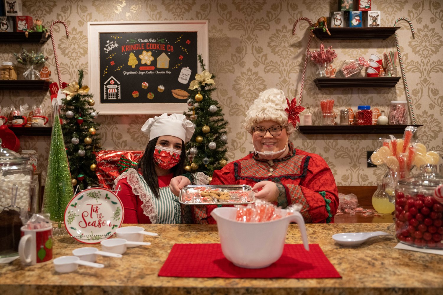 Mrs. Claus and her trusted elf, Cinnamon, work hard to bake Santa's favorite confections to power him through an around-the-world trip of gift-giving.